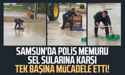 Sağanak yağmur altında görev başında: Polis memurunun mücadelesi kamerada