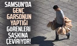 Samsun'da elinde 100 ekmek taşıyan garson görenleri şaşırtıyor