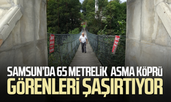 Camiye ulaşım için yapılan 65 metrelik asma köprü ilgi odağı oldu