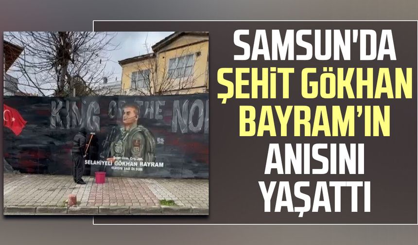 Şehidin resmini grafiti yapan gence Başkan Doğan'dan hediye